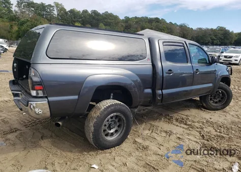 2015 Toyota Tacoma Double Cab Long Bed z USA, uszkodzony, nr VIN 3TMMU4FN7FM077826